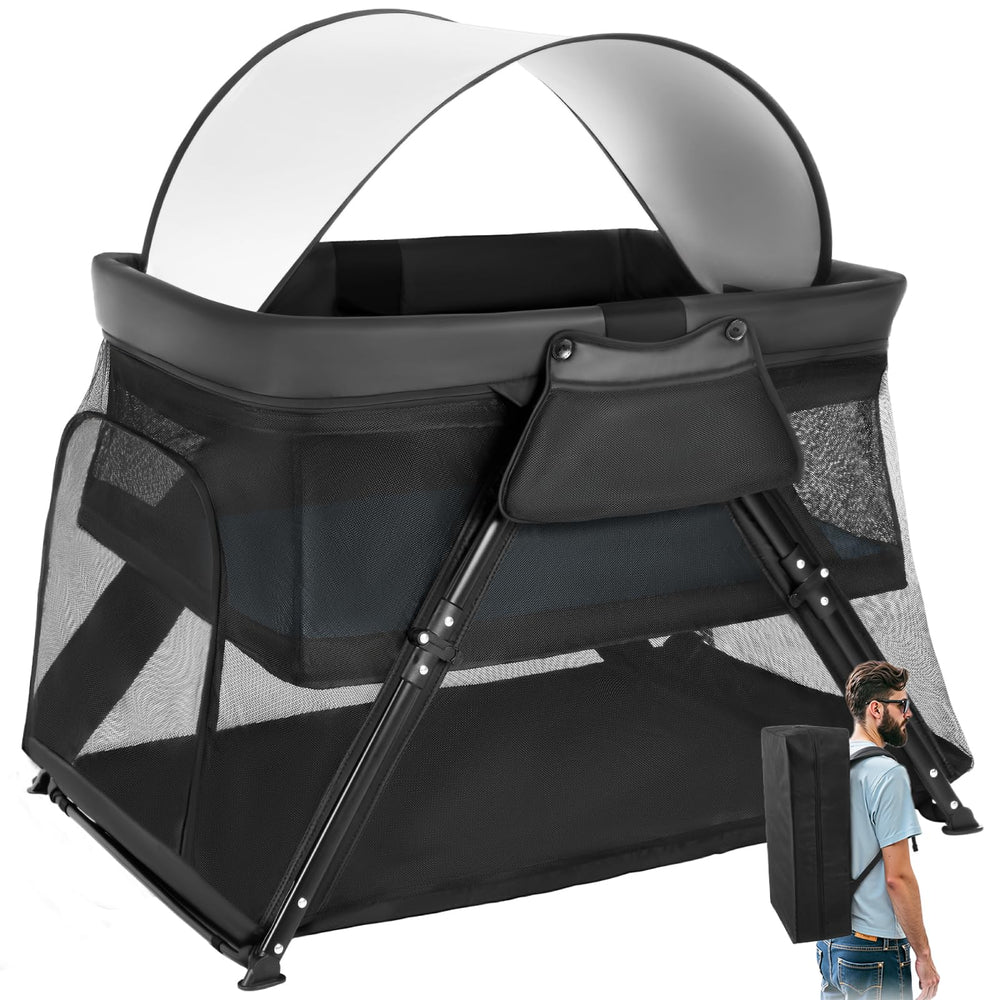 Lilian&Gema 2-in-1 travel crib side view highlights a compact, travel-ready sleep space.