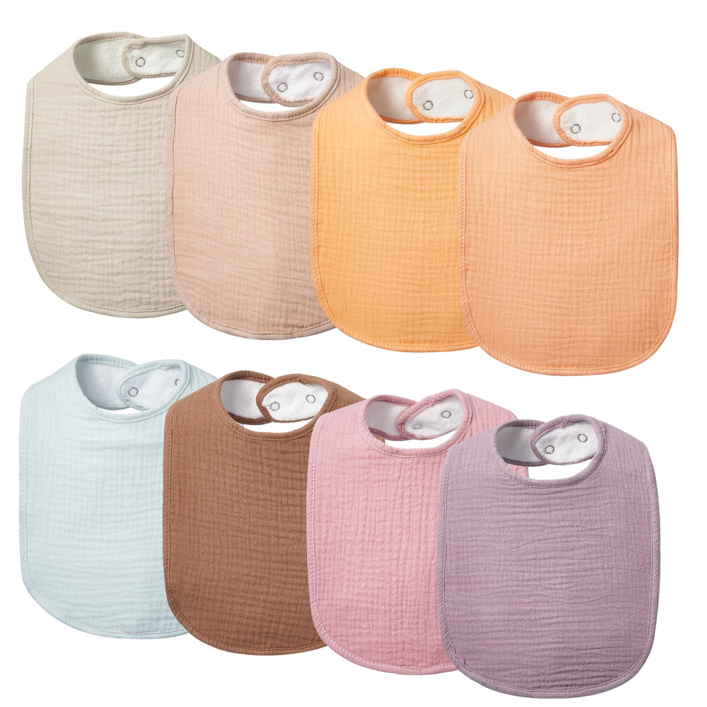 Lilian&Gema muslin baby bibs unisex colors close-up shows soft fabric comfort.