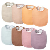 Lilian&Gema muslin baby bibs unisex colors close-up shows soft fabric comfort.