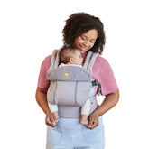 LÍLLÉbaby Complete All Seasons carrier demonstrates 6-position versatility for front, hip, and back carrying