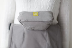 LILLEbaby cushion removed from carrier shows washable, quick-dry fabric and care.