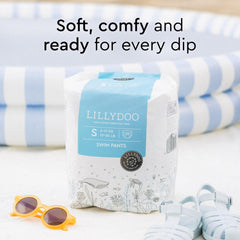 LILLYDOO Blue Whales swim diapers worn by a baby during pool time