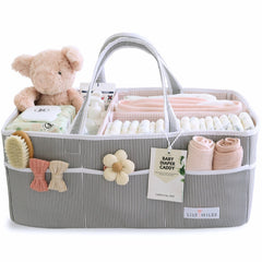 Lily Miles diaper caddy with open compartments for quick diaper changes.