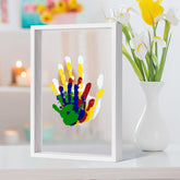 Liovsiso Clear Family Handprint Kit frame setup showing organized supplies for timeless keepsakes.
