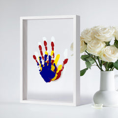 Liovsiso Clear Family Handprint Kit paints and brushes enabling safe, vibrant baby prints.