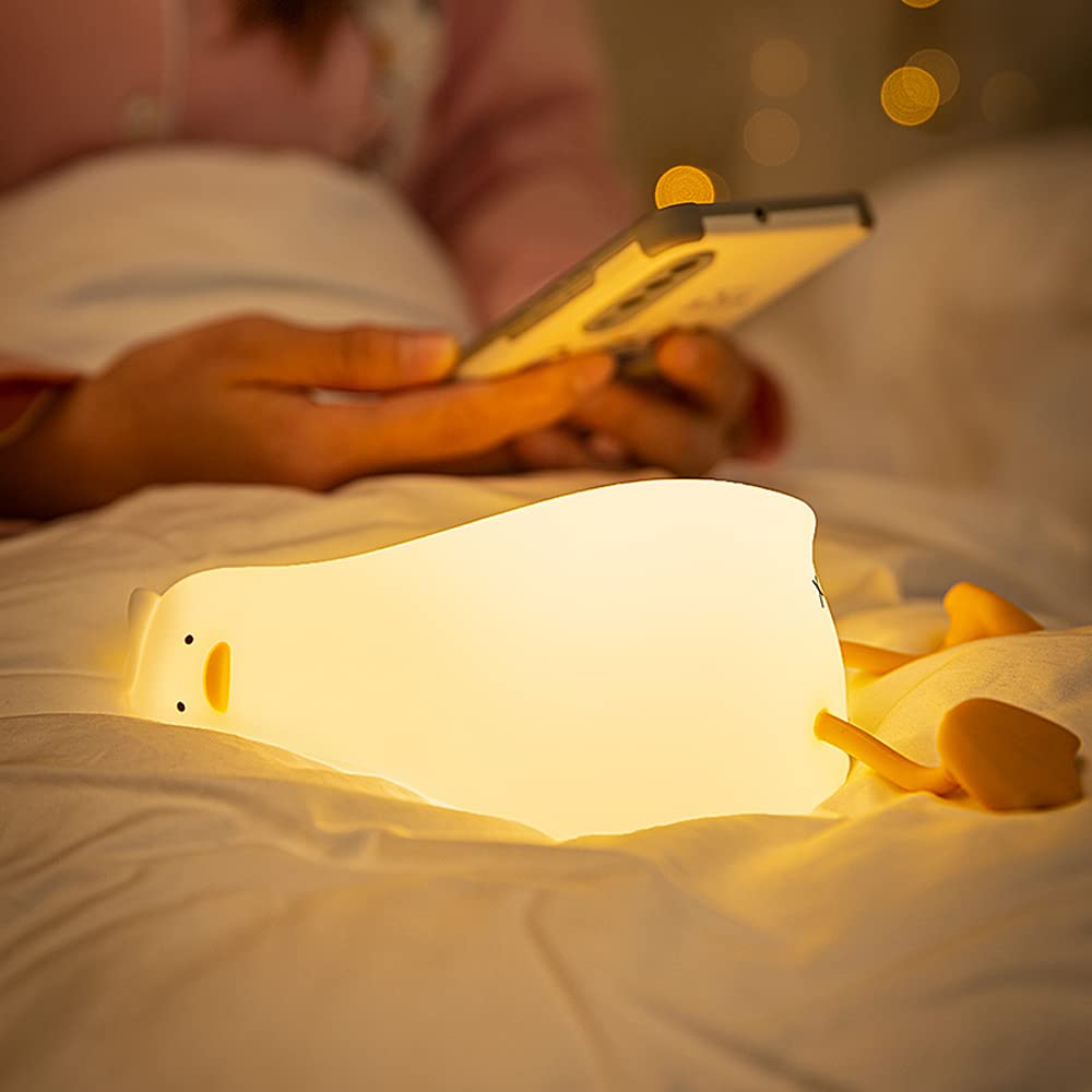 Liqmin Duck Night Light on bedside with warm, comforting glow for late-night feeds