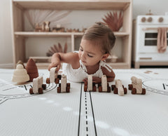 Little Bot Ofie mat rolled for storage; space-saving convenience.
