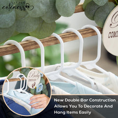 Little Cuteness eucalyptus decor adds calming greenery to a nursery display.