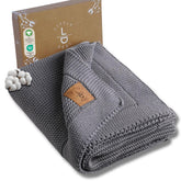 Little Dedi blanket in a nursery showing soft organic cotton for delicate skin.