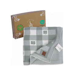 Little Dedi four-leaf clover closeup for gentle swaddling with soft organic cotton.
