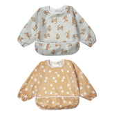 Little Dimsum Mess-Proof Baby Bib full-coverage shields outfits during meals.