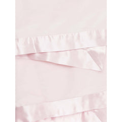 Little Giraffe velvet blanket pink on stroller for on-the-go comfort and warmth.