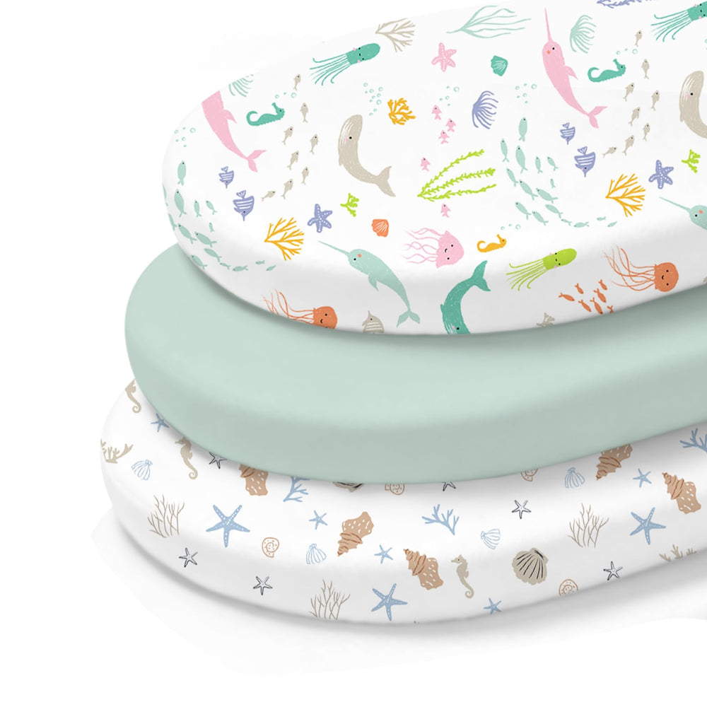 Little Grape Land Ocean Friends pattern bassinet sheet offers cozy comfort.