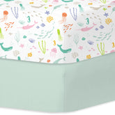 Little Grape Land pastel ocean crib sheet on mattress, soft microfiber for sensitive baby skin.