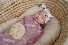 Little Jump swaddle blanket in stroller—perfect travel companion.