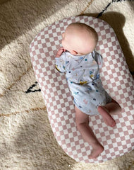 Little Jump coffee checkered lounger cover demonstrates easy slip-on replacement for quick changes.