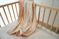 Little Jump muslin blanket crib bedding use demonstrates large 47x47 size for generous infant coverage.