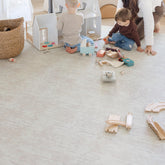 Little Landings Sandstone play mat closeup of cushioned, soft tummy-time surface