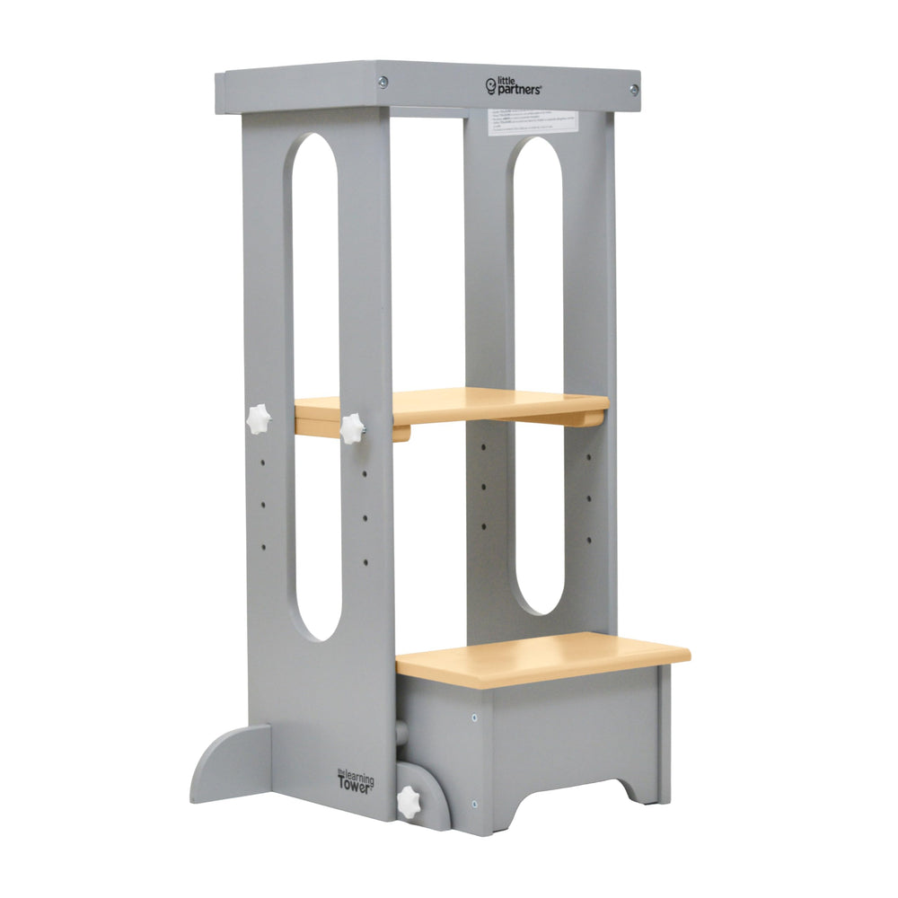 Little Partners Foldable Toddler Tower cooking setup shows a child at the counter ready for hands-on learning.
