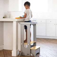 Folded storage view of the Little Partners Tower for compact home organization.