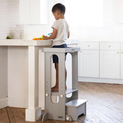 Little Partners Learning Tower kitchen setup demonstrates early independence with supervision.