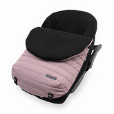 Little Unicorn footmuff open-back design enables harness access for quick checks.