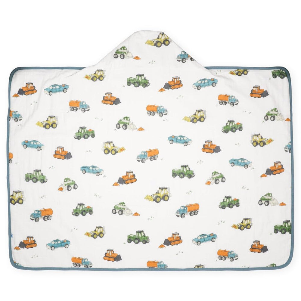 Little Unicorn hooded bath towel with work trucks design for playful drying sessions.