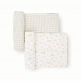 Little Unicorn swaddle rainbows pack flatlay highlights cozy secure swaddling