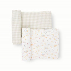 Little Unicorn swaddle rainbows pack flatlay highlights cozy secure swaddling