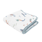 Little Unicorn mermaids 4-layer muslin quilt close-up highlighting plush softness for babies.