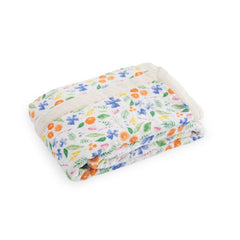 Little Unicorn newborn receiving quilt Mountain Bloom folded illustrates compact travel-ready warmth for on-the-go snuggles.