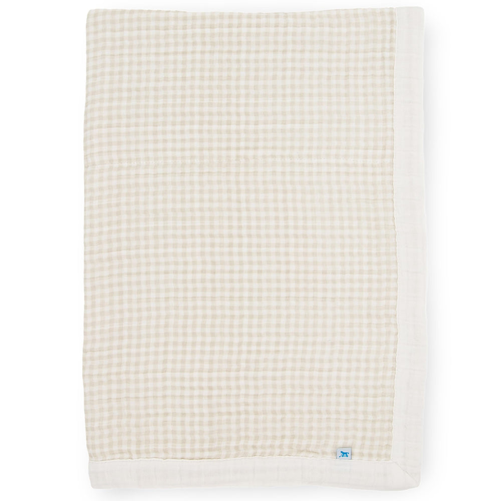 Little Unicorn newborn receiving quilt with four muslin layers for gentle cuddles and naps