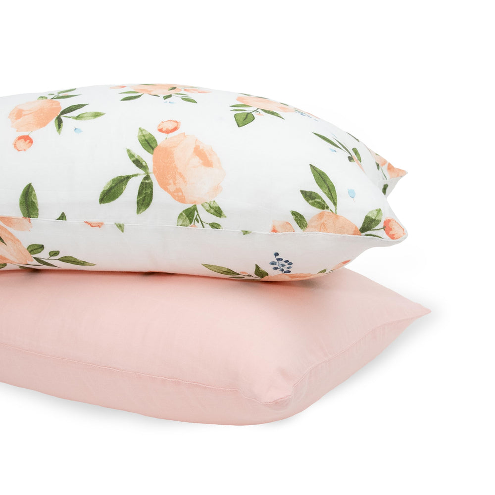 Little Unicorn watercolor roses grande 2 pillowcase; soft breathable muslin for cozy nights.