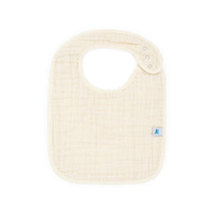 Little Unicorn bib adjustable snap closure shows growing baby fit up to 3 years.