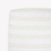 Little Unicorn Premium Crib Sheet fabric texture close-up, showing soft, breathable muslin.
