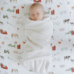 Little Unicorn Premium Crib Sheet on crib mattress demonstrates breathable year-round comfort