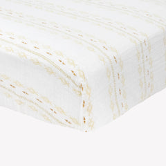 Little Unicorn Premium Crib Sheet on a crib mattress, snug fit and deep pockets.