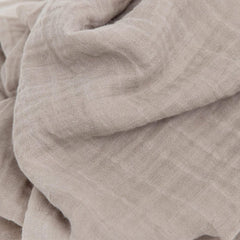 Little Unicorn swaddle Planetary 2 nursing-use shot emphasizes easy, comfortable feeding moments.