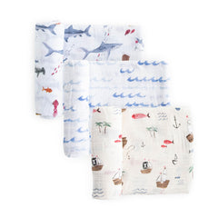 Little Unicorn premium muslin swaddle Shark-2 design offers cozy swaddling and playful style.