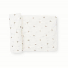 Little Unicorn Premium Stretch Knit Swaddle Grey Cross closeup shows buttery-soft weave for newborn comfort.