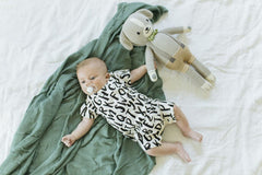 Little Unicorn Sage Deluxe Swaddle bamboo-rayon texture feels breathable.