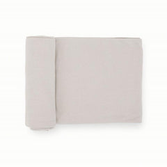 Little Unicorn swaddle blanket Pebble soft weave in-use demonstrates secure, comfortable cuddles.