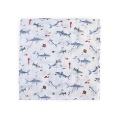Little Unicorn swaddle blanket during sleep time for soothing warmth.
