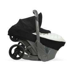 Little Unicorn Winter Car Seat Cover insulated fabric highlights warmth and wind protection for cold commutes.