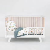 Little Unicorn work-trucks comforter close-up shows soft, lightweight warmth.