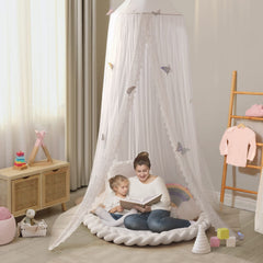 LOAOL Butterfly kid playing under canopy evokes imaginative playtime sanctuary.