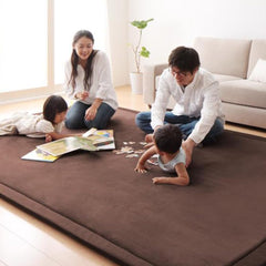 Loartee Coral Velvet Crawling Rug coffee anti-slip bottom prevents shifting during play.