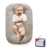 Loevin Baby Lounger with soft cotton cover for cozy infant comfort during play.