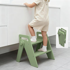 LOHASOK wooden 2-step stool folded green for compact storage.