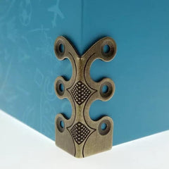 Loisdaro brass corner protector on cabinet corner adds vintage style and protection